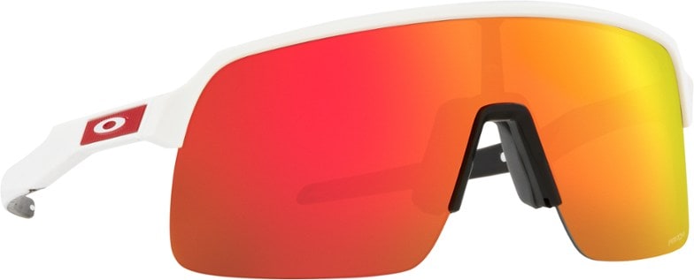 Cyclist wearing Oakley Sutro Lite sunglasses, showing clear visibility on a sunny day.