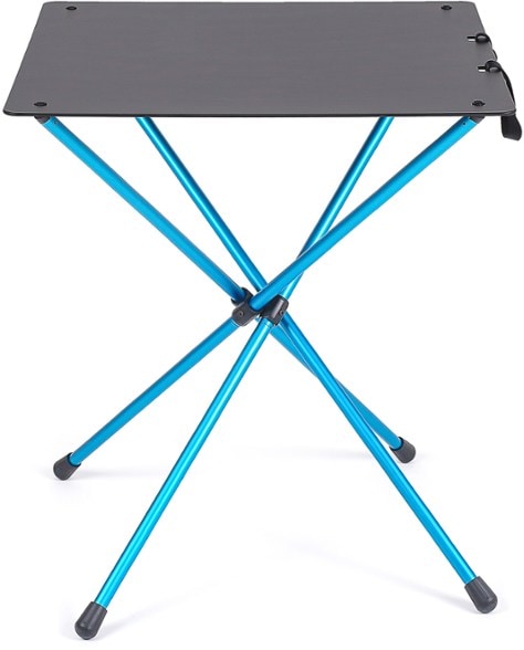 A Helinox Outdoor Dining Table set up for a camping dinner.