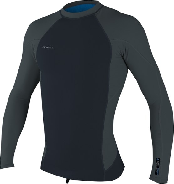 O'Neill Hyperfreak rashguard in action while surfing, showcasing its flexibility and comfort.