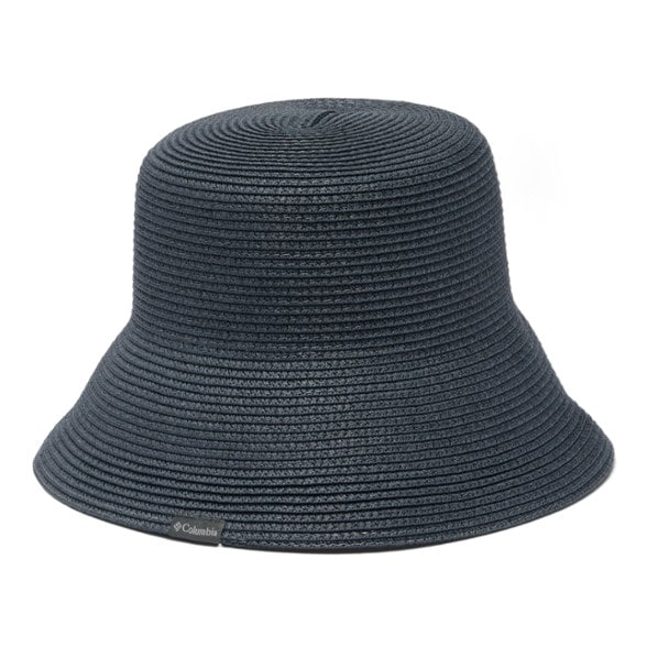 Woman wearing Global Adventure bucket hat on hiking trail, sun protection visible