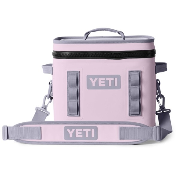 YETI Hopper Flip 12 soft cooler being carried on a camping trip