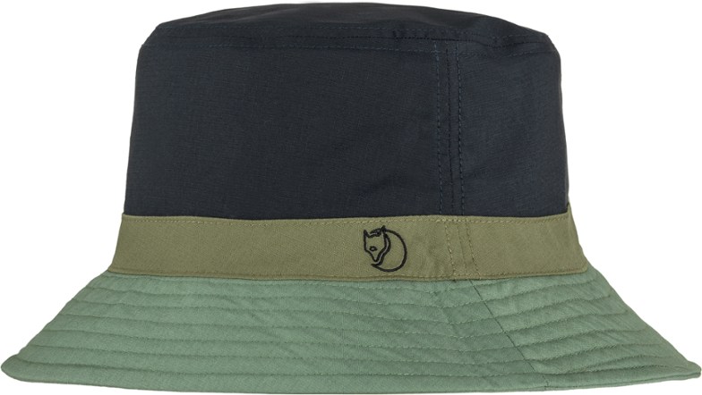Front view of reversible bucket hat showing the embroidered logo on the solid black side