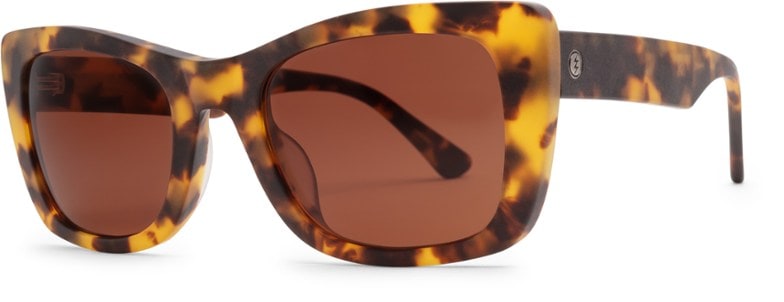 Front view of Portofino eco-polarized sunglasses on a wooden table at the beach.