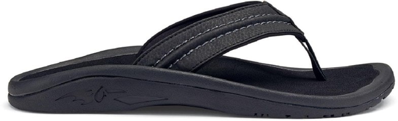 ComfortWave men's flip flops on a beach background, showcasing comfort and style