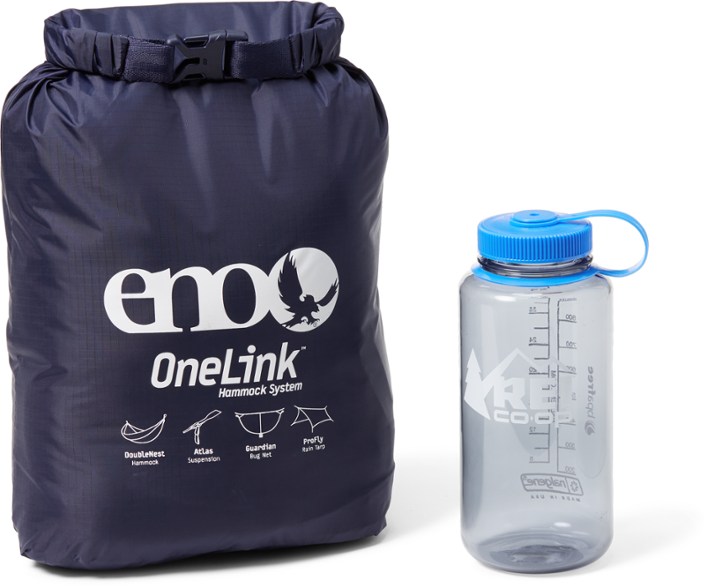 OneLink Adventure Hammock System setup with lush trees in the background