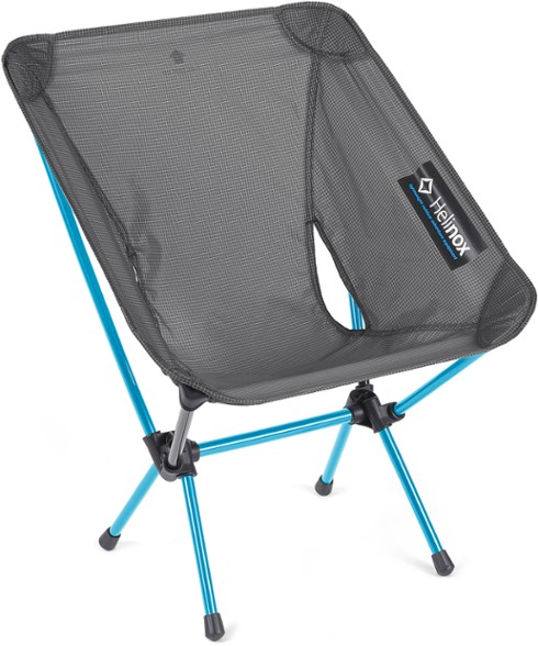 Ultralight Trek Chair Pro in use during a camping trip, showcasing its comfort and durability