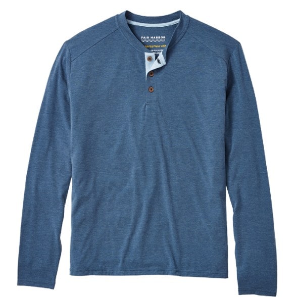 Men's henley shirt in a serene outdoor setting, showcasing UPF 50 protection and moisture-wicking fabric.