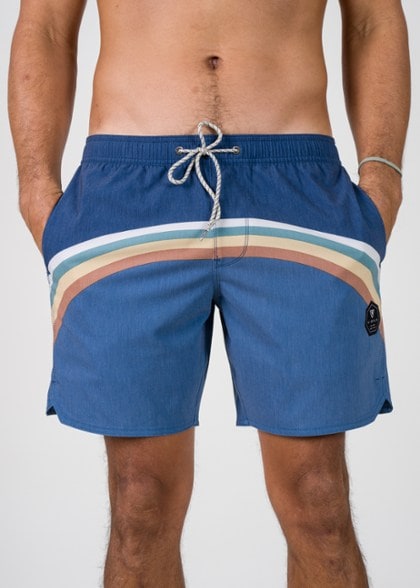 Men enjoying the beach wearing VISSLA coconut fiber board shorts.