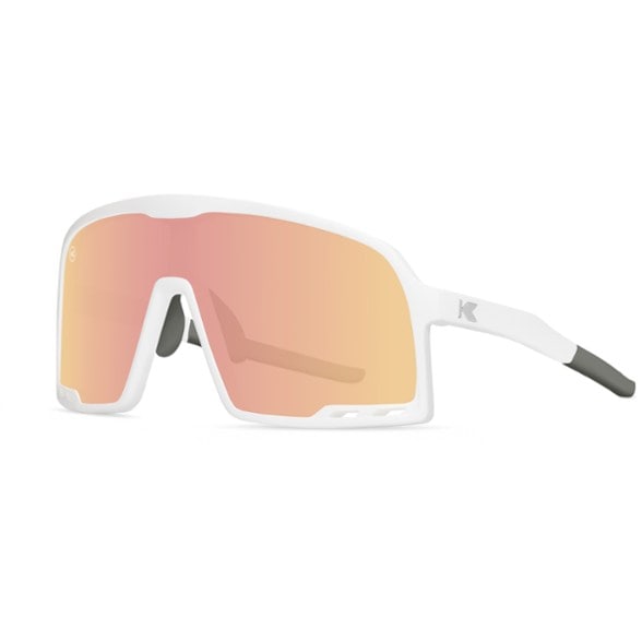 Close-up of Campeones impact-resistant sunglasses showing the full lens coverage and impact-resistant frame