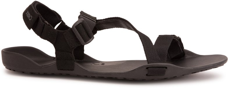 Men wearing Z-Trek sandals wading through a river, showcasing water resistance
