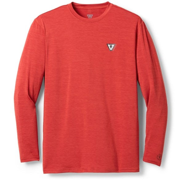 Men wearing Vissla Twisted rashguard while surfing in waves