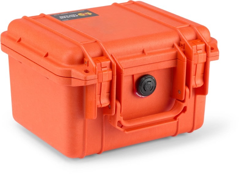 Pelican 1300 protective case with foam insert shown open on a backpacking table