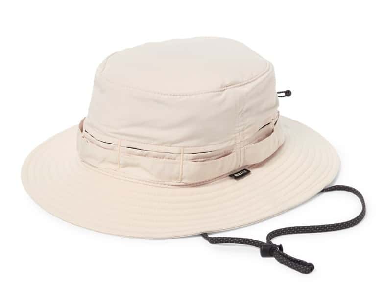 Adventure-ready packable bucket hat with adjustable chin strap and vent system, perfect for hiking.