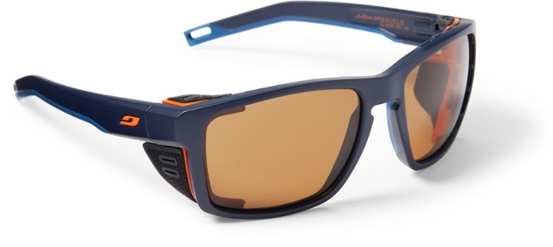 Julbo Shield Pro sunglasses, close-up, showing robust frame and dark Spectron 4 lenses, ideal for bright sunlight.