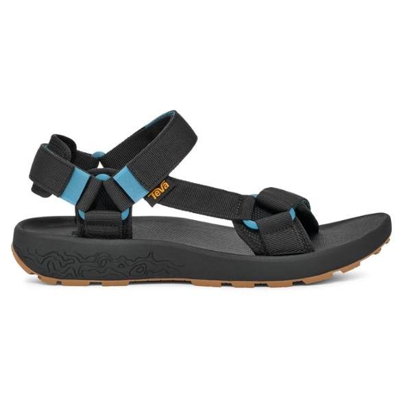 Hydratrek men's waterproof sandals with textured grip soles on wet rocks