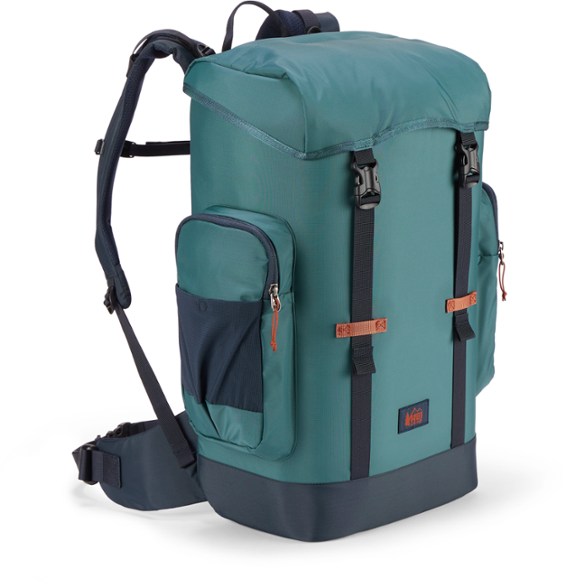 Front view of TrailChill Hybrid Cooler Backpack on beach sand with drinks inside