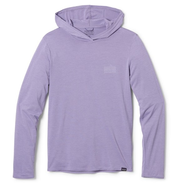 Patagonia Men's Capilene Cool Daily Graphic Hoody in action during a hiking trip, highlighting its quick-dry feature and vibrant graphics.