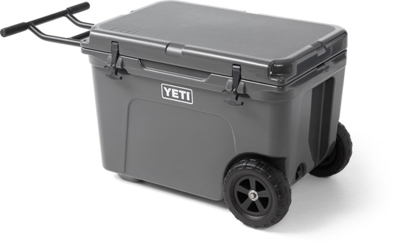 YETI Tundra Haul Wheeled Cooler being towed on a camping trip