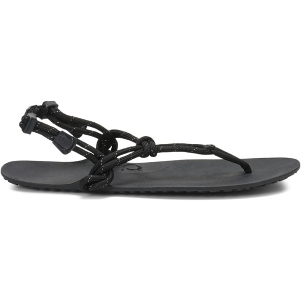 A pair of Xero Shoes Genesis sandals in black, seen from an overhead angle, highlighting their minimalist design and soft toe loop.