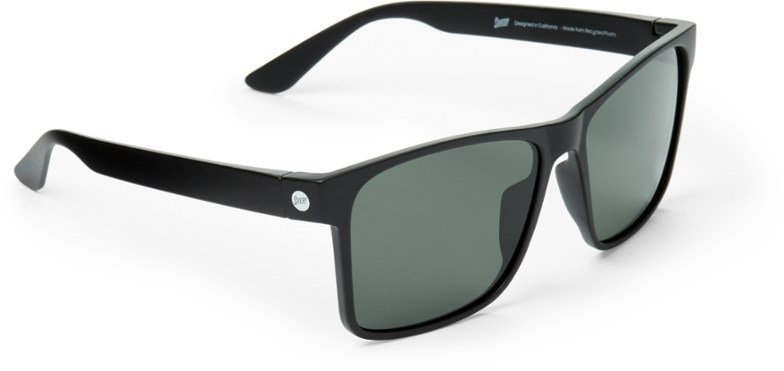 Close-up of Sunski Puerto polarized sunglasses showing the bold square frame and green emerald lenses