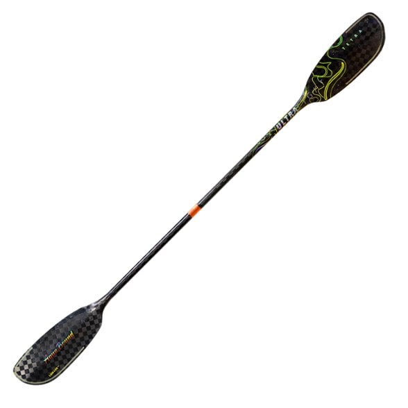 Lightweight kayak paddle with foam core blades in action on calm water