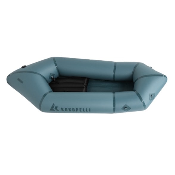 Kokopelli Rogue-Lite packraft displayed on a tranquil lake, highlighting its sleek design and TiZip storage.