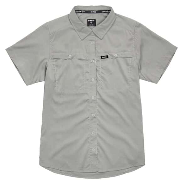 Front view of NRS women's quick dry fishing shirt in action by the river.