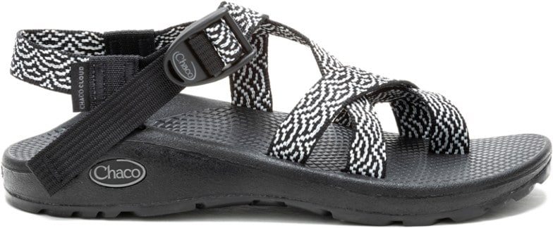 Chaco Women's Z/Cloud 2 Adventure Sandals on a rocky riverbank, demonstrating their grip and support.