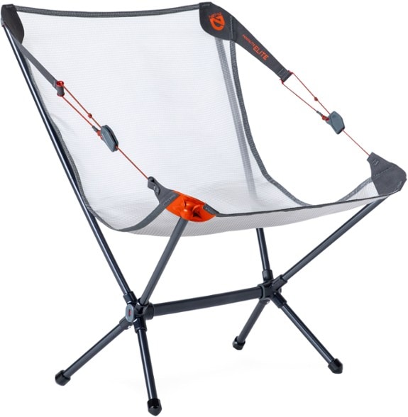 Moonlite Elite reclining backpacking chair in gray, fully extended on grassy terrain