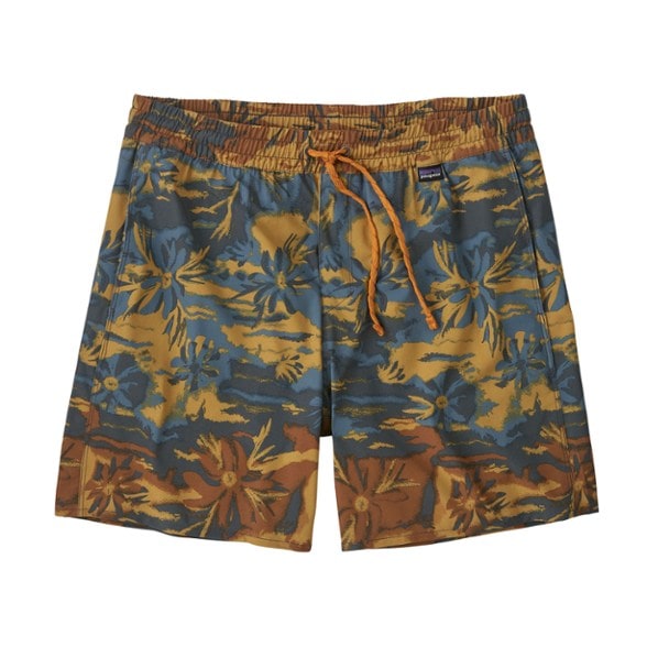 Side view of men's volley shorts worn at the beach, showing pocket and drawcord details