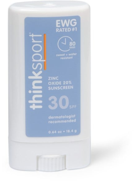 Thinksport SPF 30 mineral sunscreen stick in a hand for easy application.
