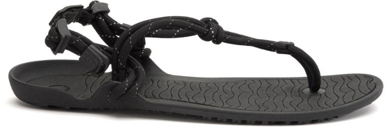 Aqua Cloud sandals on a sandy beach, highlighting their minimalist design and open toe feature.