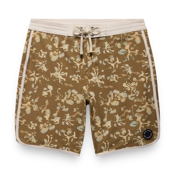 Retro Waves men's board shorts displayed on a beach setting, showcasing their vintage style.