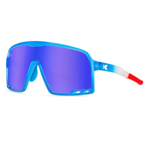 Front view of Knockaround Campeones kids sunglasses on a sunny day.