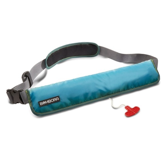 Bombora slim inflatable life jacket shown in use on a paddleboard, highlighting its sleek design.