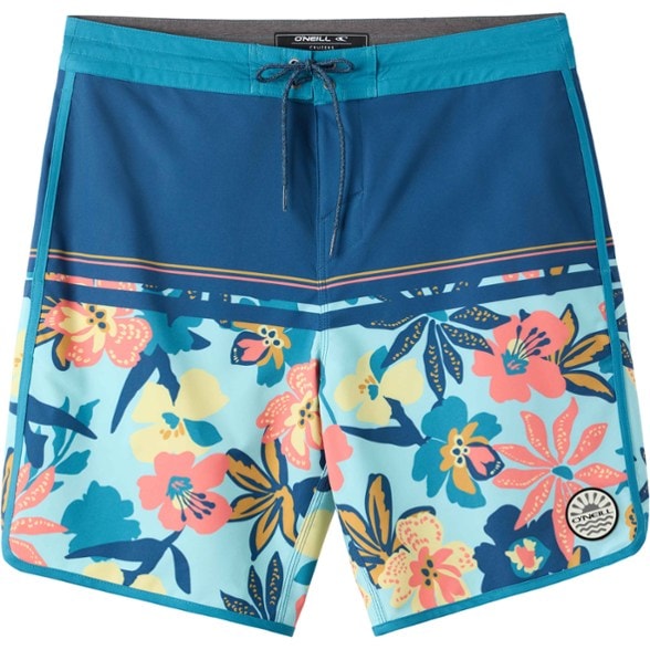 O'Neill Cruzer scallop board shorts laid flat showing the scallop hem and stretch fabric