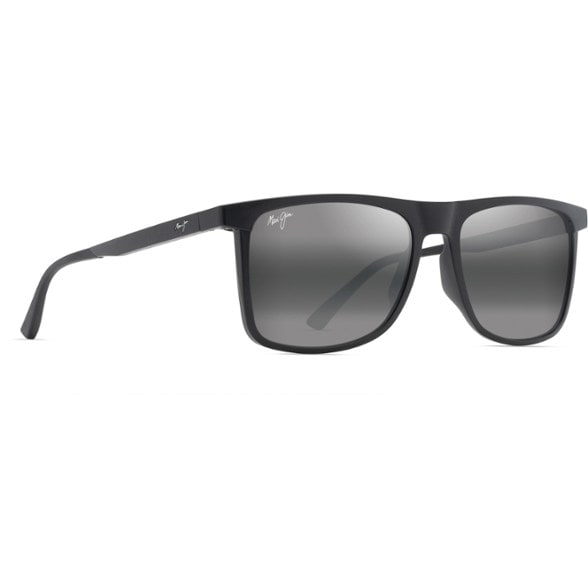 Makamae polarized sunglasses on a beach, showcasing UV protection for outdoor activities