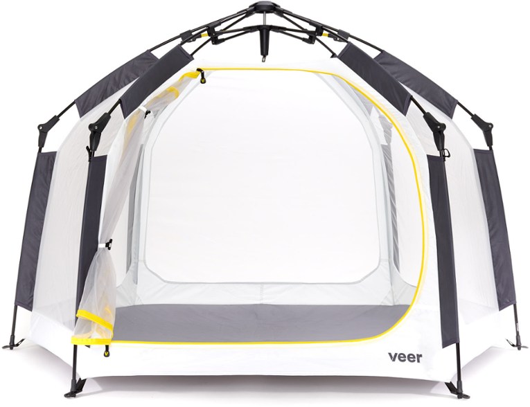 Kids playing in outdoor play yard with canopy