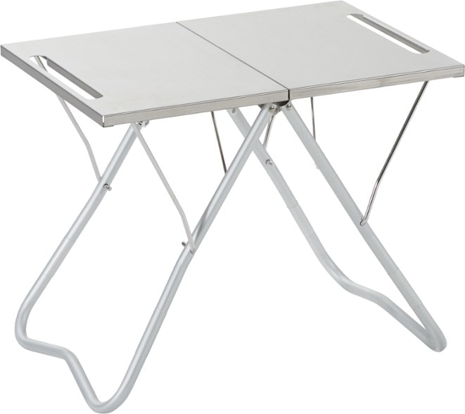 FirePit Ready Stainless Steel Table set up near a campfire