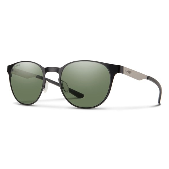 Apex Polarized Metal Sunglasses on a wooden surface, showcasing stylish design