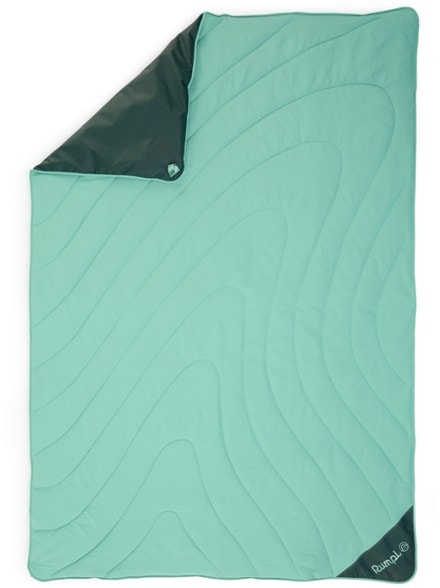 EcoShield Overland Ground Mat in use on a rocky beach