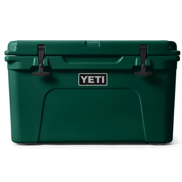 YETI Tundra 45 Expedition Cooler showcased outdoors, open with ice and drinks inside, highlighting its spacious interior for camping gear.