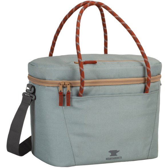 Soft-sided cooler being carried on a hike