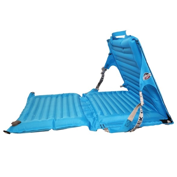 AirLounger inflatable chair deployed at lakeside campsite