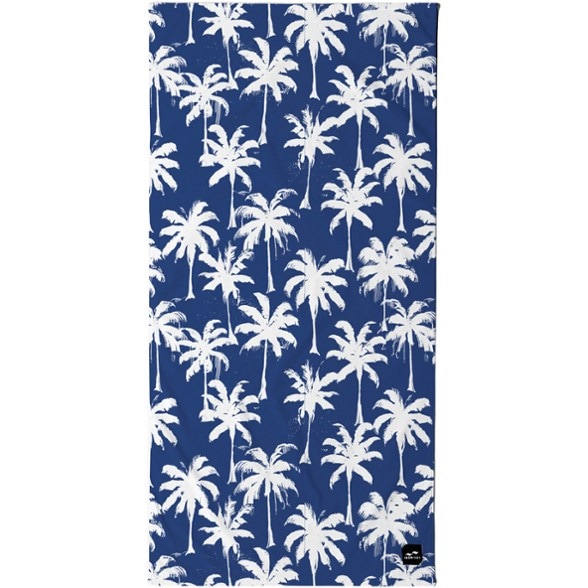 EcoCharm Sustainable Beach Towel in use at the beach, showcasing its absorbency and comfort.