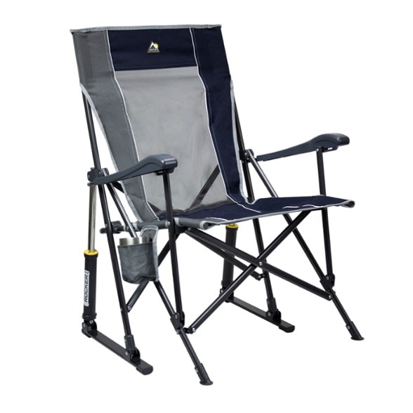 GCI Outdoor RoadTrip Rocker chair with beverage holder at a campsite