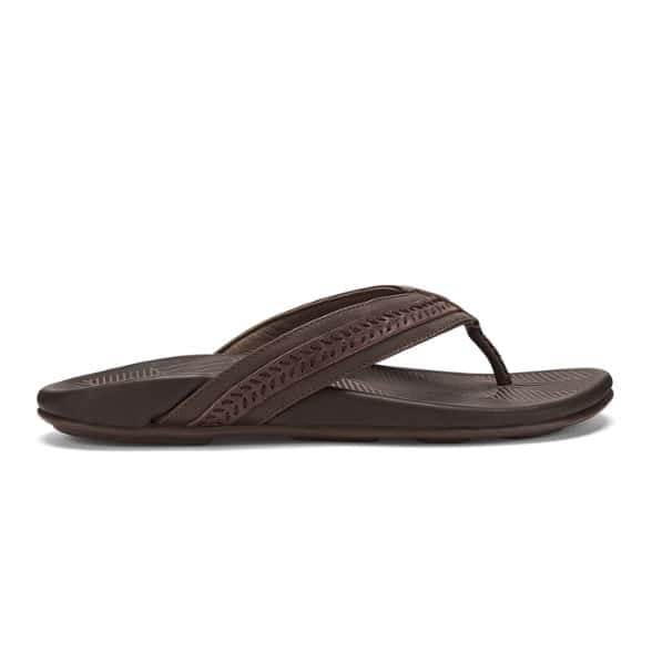 OluKai Aho leather flip flops for men, angled view showing craftsmanship and comfort features.