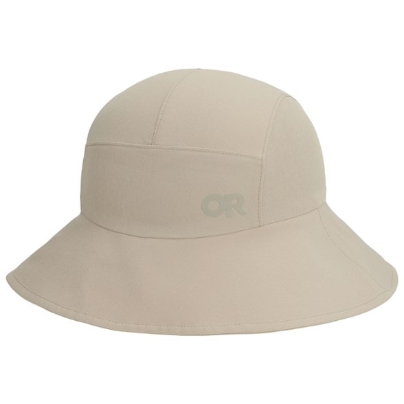 Woman wearing Swift Lite UPF hiking hat on mountain trail with extended brim providing shade