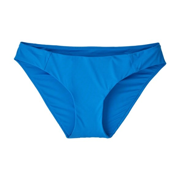 Front view of Patagonia swimwear featuring Sunamee swimsuit bottoms in motion during a coastal swim