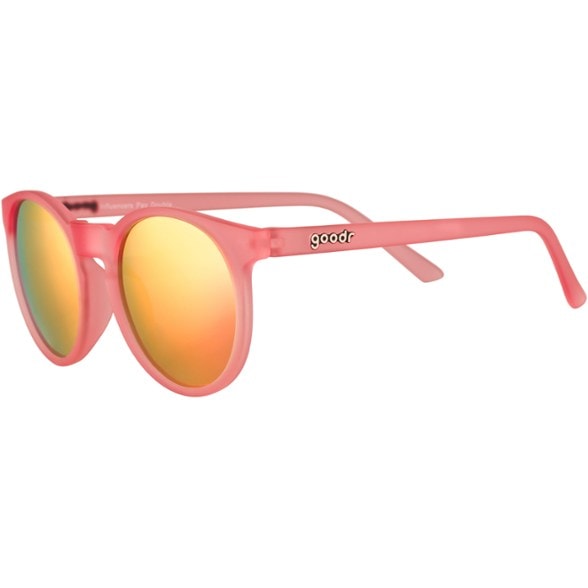 Woman wearing Circle G round sunglasses during trail run, demonstrating secure fit